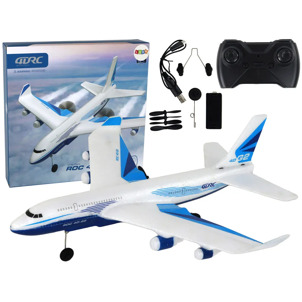 Biały zdalnie sterowany samolot RC 4D-G2 podczas lotu z włączonymi światłami LED