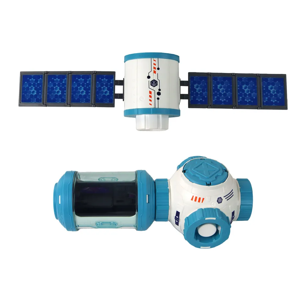 Dziecko bawiące się zestawem rakietą i stacją kosmiczną