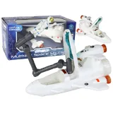 Zabawka rakieta kosmiczna z efektami świetlnymi na tle gwiazd