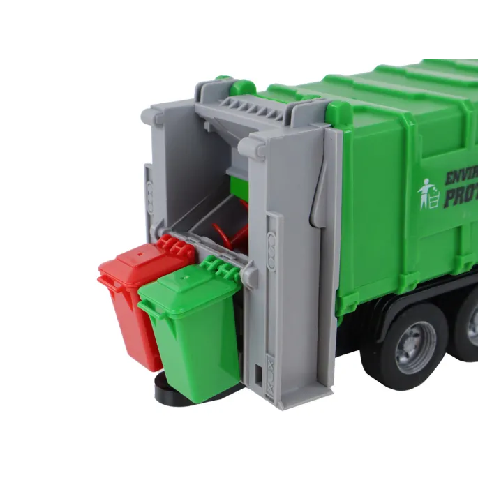 Ciężarówka śmieciarka z dźwigiem w skali 1:16 na podłodze