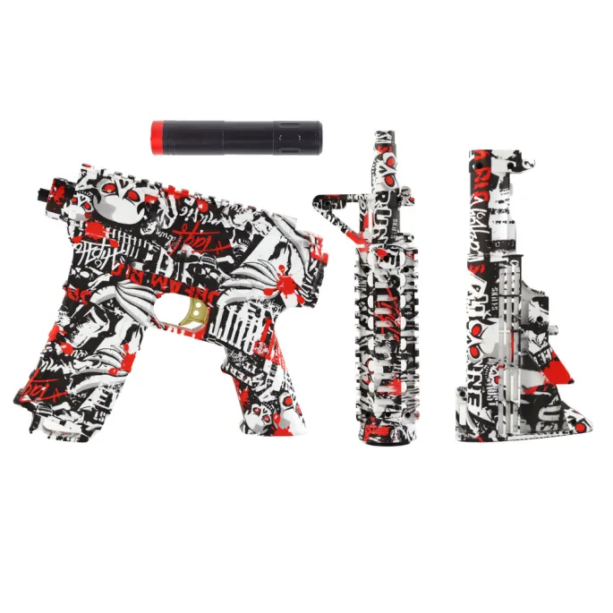 Zbliżenie na designerski elektryczny karabin na żelowe kulki w graffiti