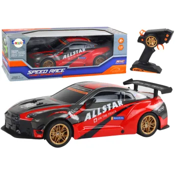 Duże czerwone auto sportowe zdalnie sterowane na białym tle