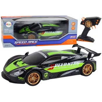 Duże zielono-czarne auto sportowe RC z widocznymi złotymi felgami