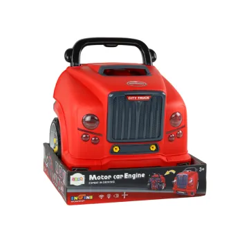 Dziecko bawiące się czerwonym warsztatem samochodowym z akcesoriami