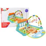 Kolorowa mata gimnastyczna z pianinkiem dla niemowląt podczas zabawy