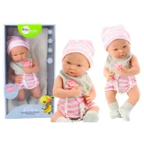 Realistyczna lalka bobas w biało-różowym ubranku z czapeczką i smoczkiem