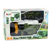 Migające światła w zdalnie sterowanym kombajnie rolniczym podczas jazdy