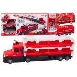 Czerwona laweta z rozłożonym torem wyścigowym i autkami strażackimi