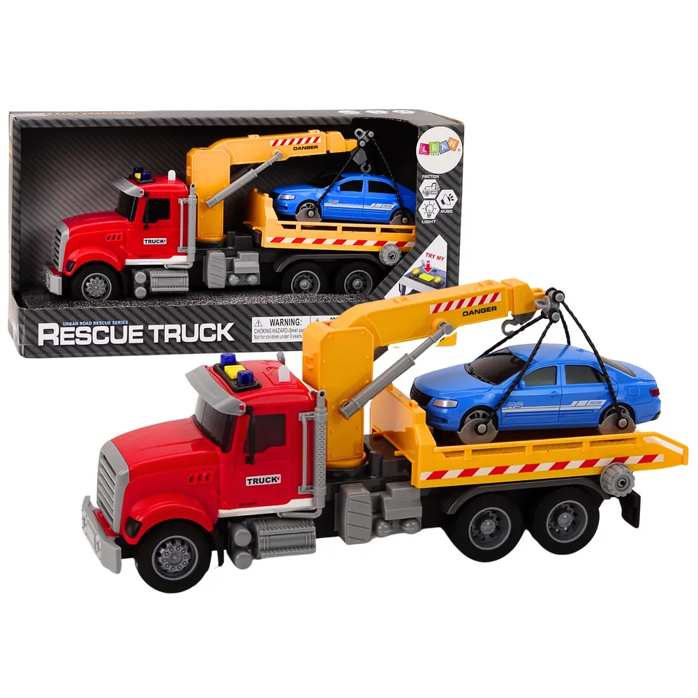 Czerwona ciężarówka laweta z dźwigiem i niebieskim autkiem zabawkowym