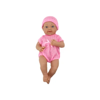 Zbliżenie twarzy laleczki bobasa z różową kokardką i czapeczką