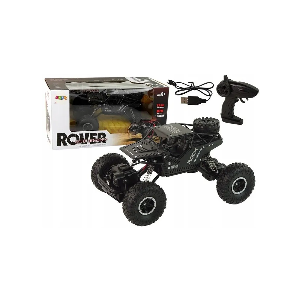 Duży samochód terenowy zdalnie sterowany 4x4 w skali 1:16 na trawie