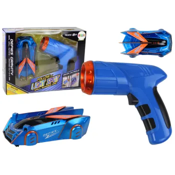 Niebieskie autko jeżdżące po ścianach sterowane laserem, widok z boku