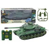 Zielony czołg RC 1:28 z obrotową wieżą na białym tle