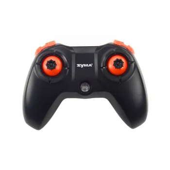 Dron RC X36 SYMA podczas startu na zewnątrz w promieniach słońca