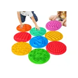 Rozłożony zestaw 20 silikonowych plansz sensorycznych na podłodze