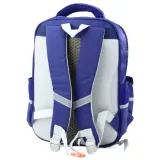 Granatowy plecak szkolny z naszywkami dinozaurów na białym tle