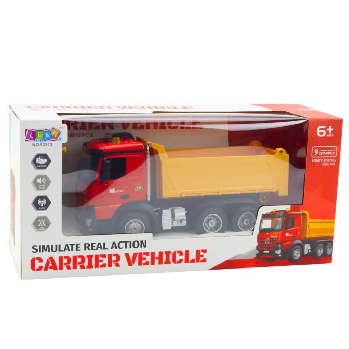 Wywrotka RC żółto-czerwona podczas zabawy na dywanie