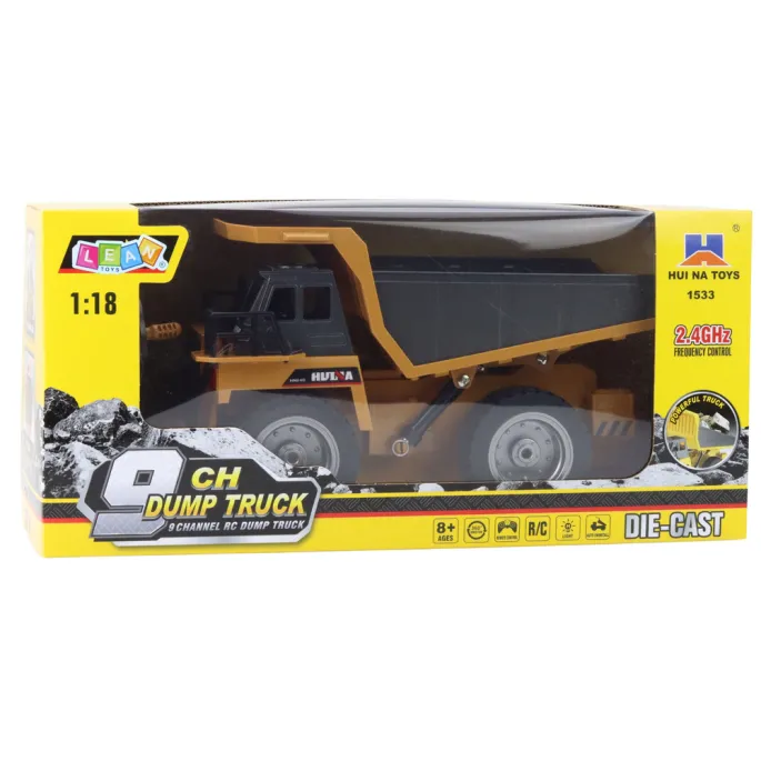 Ciężarówka wywrotka RC Huina z pilotem i akcesoriami obok pojazdu