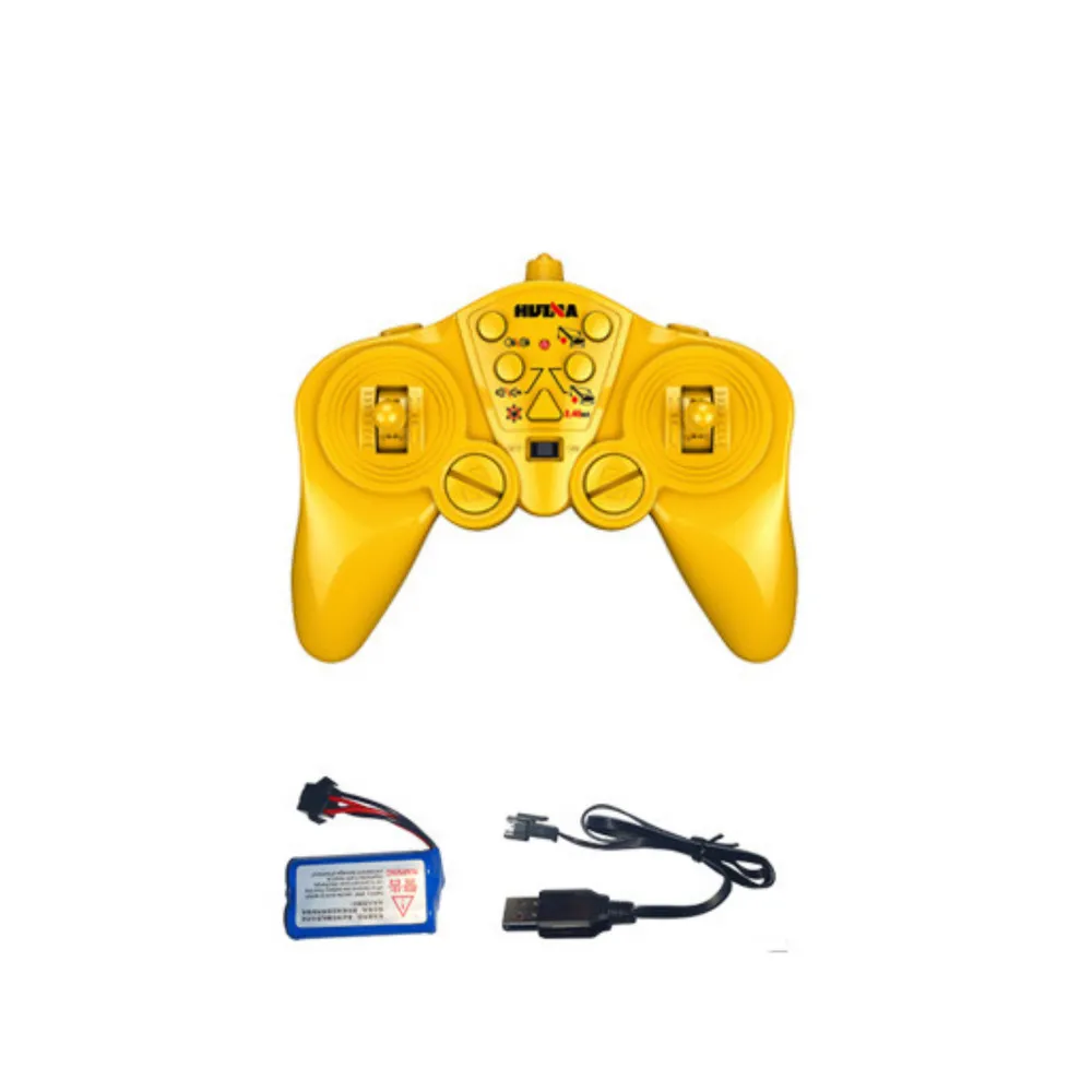 Dźwig gąsienicowy Huina podczas pracy na zabawkowym placu budowy