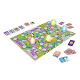 Zbliżenie na karty i planszę gry rodzinnej Magajaja Unicorns Trefl