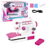 Kolorowa maszyna do szycia dla dzieci z akcesoriami, niciami i materiałami
