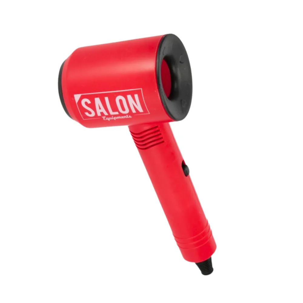 Kolorowe akcesoria fryzjerskie dla dzieci na tle prezentowego opakowania