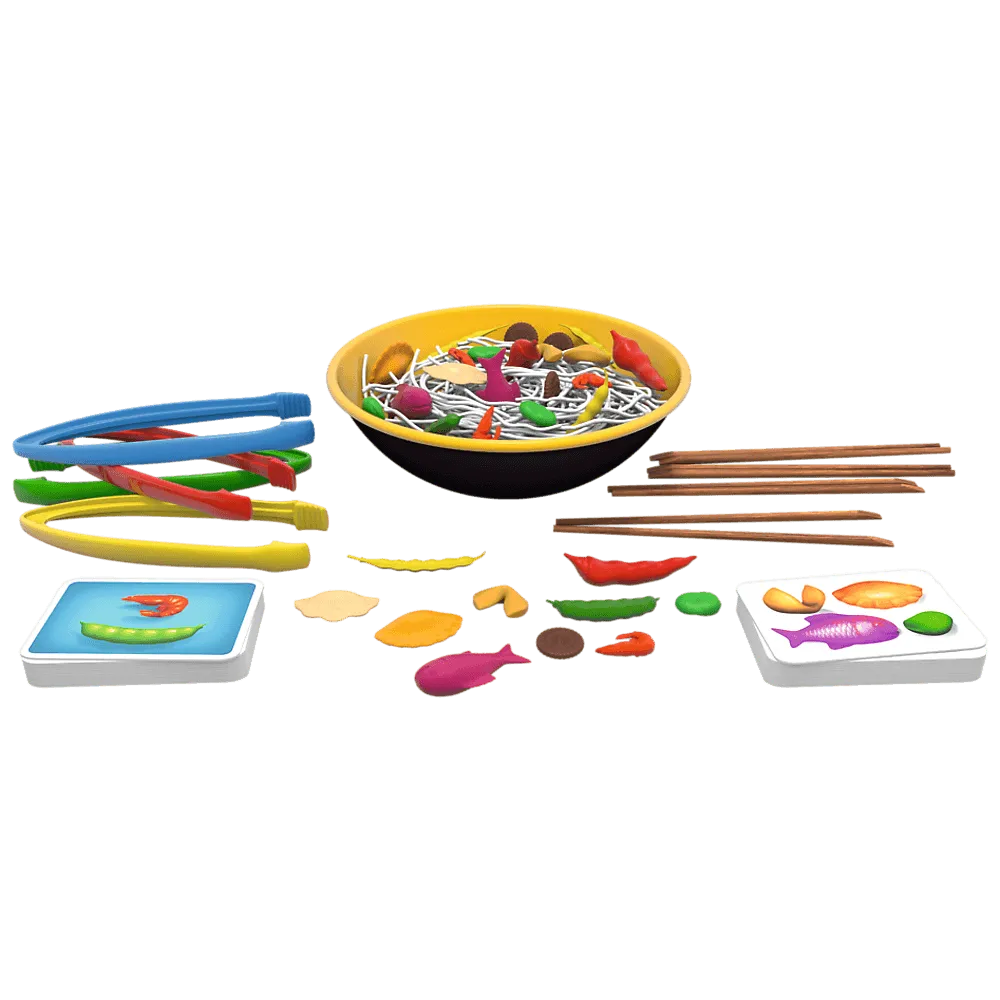 Dzieci bawiące się grą Hot Pot Trefl 01898 wyciągają składniki z miski
