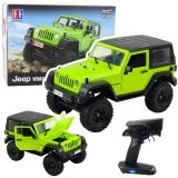Zielony RC Jeep Wrangler Rock Crawler na nierównym terenie w skali 1:14