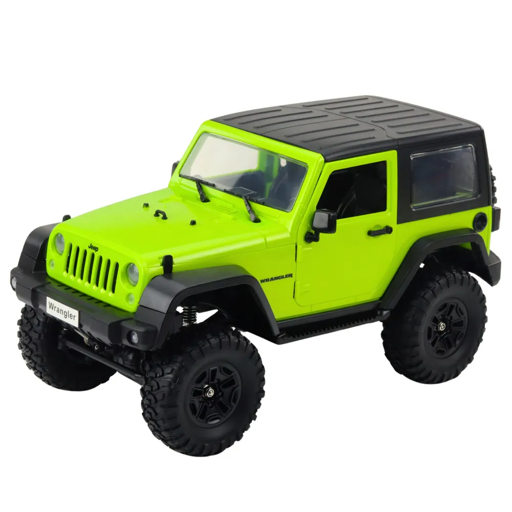Auto terenowe RC Jeep Wrangler z pilotem 2,4 GHz podczas jazdy po trawie