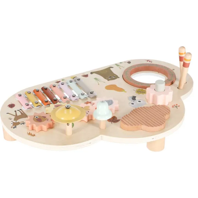 zestaw edukacyjny z bębenkiem, dzwonkiem i cymbałkami na drewnianym stoliku