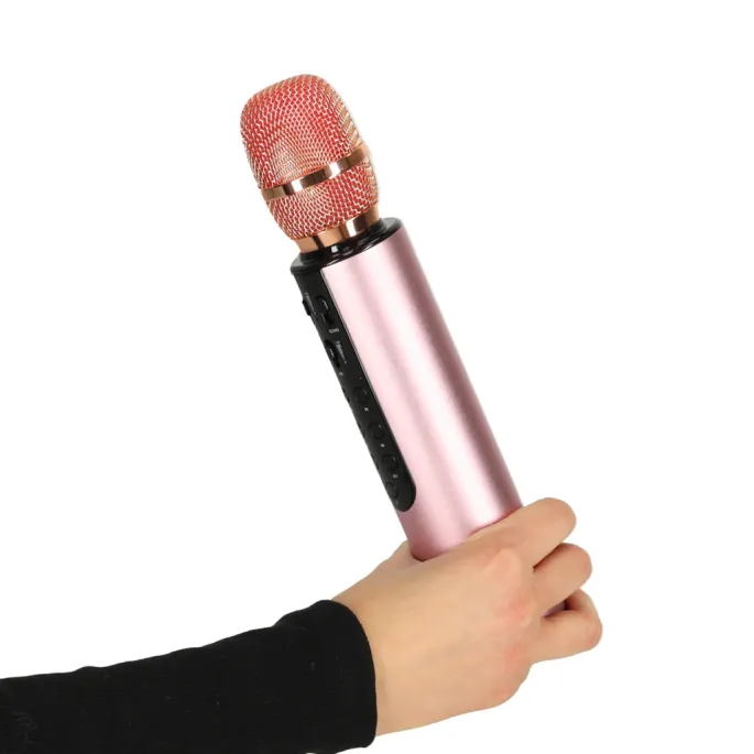 Kompaktowy mikrofon karaoke różowy z wejściem AUX i odtwarzaniem MP3
