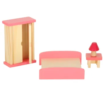 Łóżko i szafa z drewnianego zestawu do domku dla lalek