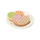 pastelowe elementy drewnianego serwisu do herbaty i kawy