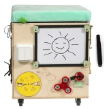 Kolorowa pufa edukacyjna z welurową poduszką i interaktywnymi zabawkami