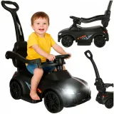 Czarny jeździk samochód 3w1 z dźwiękiem i światłami na białym tle