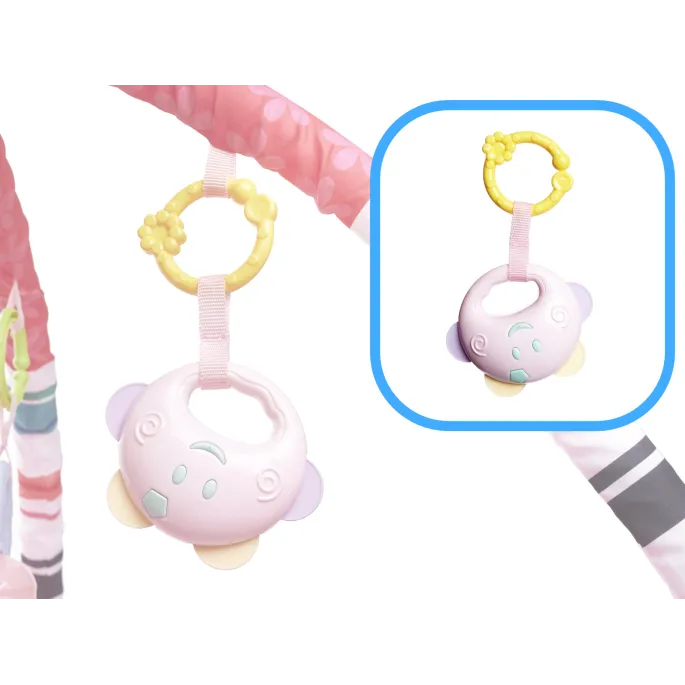 Książeczka i grzechotki z zestawu maty edukacyjnej dla dzieci