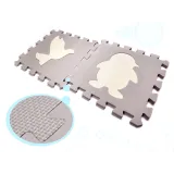 Widok na antypoślizgową powierzchnię maty edukacyjnej w kolorze szarym i ecru