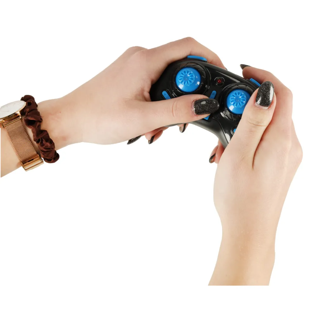 Oświetlenie LED w dronie JJRC H36 świecące podczas lotu wieczorem