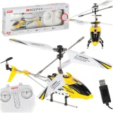 Żółty helikopter RC Syma S107H podczas lotu na tle jasnego nieba