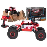 Czerwony samochód zdalnie sterowany RC Rock Crawler w terenie