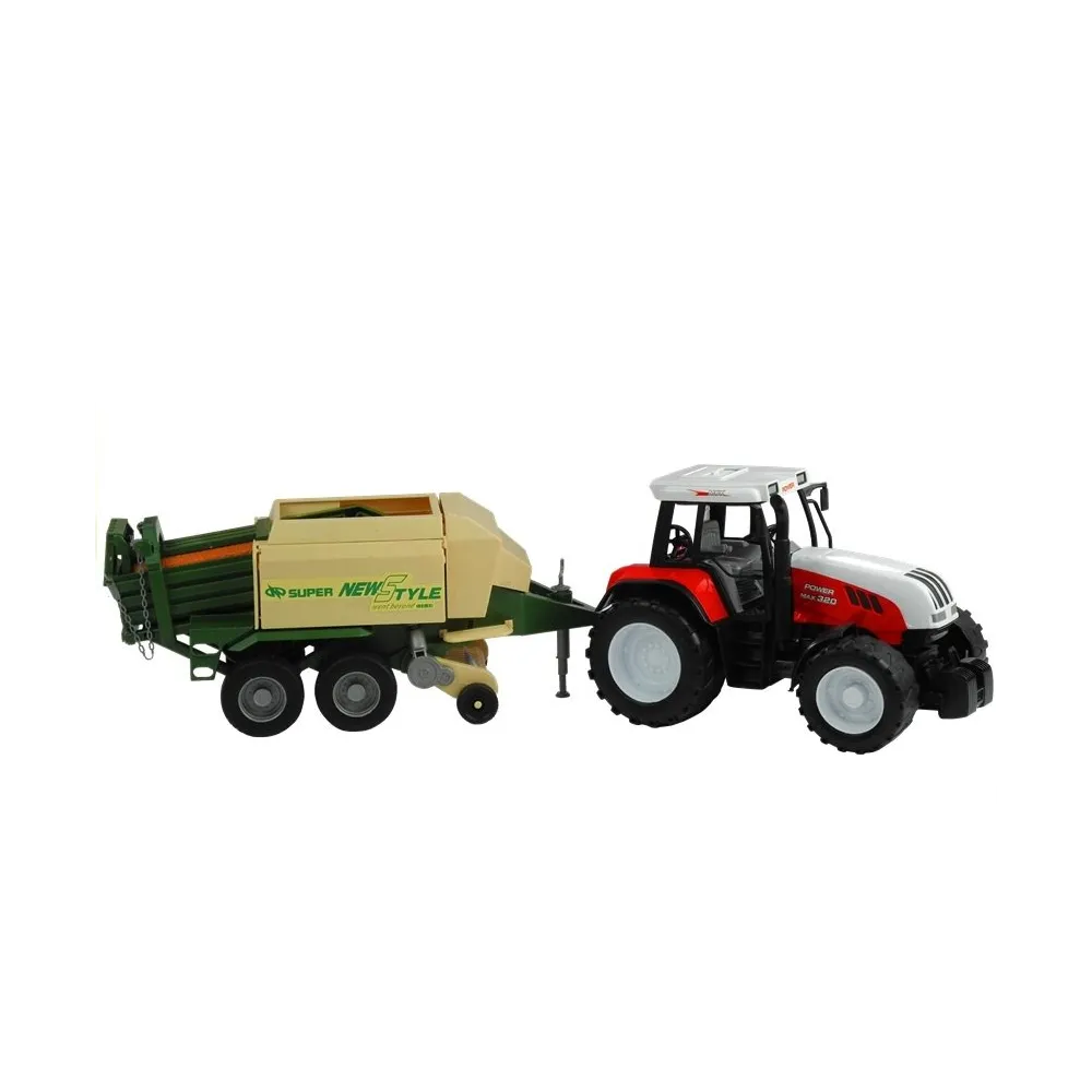 Zielony traktor z obszerną przyczepą i ruchomymi elementami