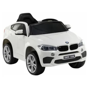 Białe auto BMW X6 na akumulator z miękkim siedzeniem dla dzieci