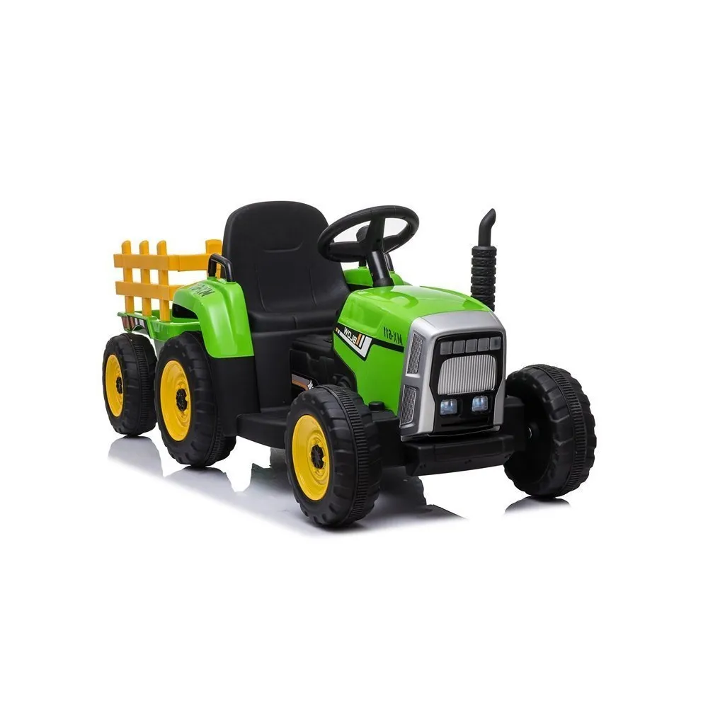 Zielony traktor na akumulator z przyczepą dla dzieci XMX611 w ogrodzie
