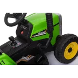 Widok z boku: traktor elektryczny XMX611 z przyczepą w akcji