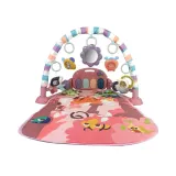 Różowa mata sensoryczna z elementami muzycznymi i gryzakami