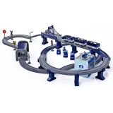 zbliżenie na niebieski pociąg i dwa wagony na torze