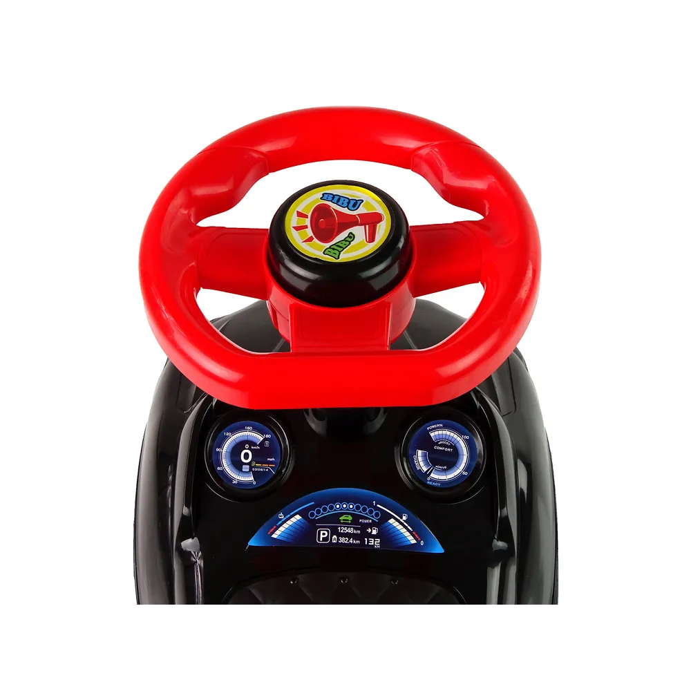 Zbliżenie na naklejki reflektorów i grill dziecięcego jeździka