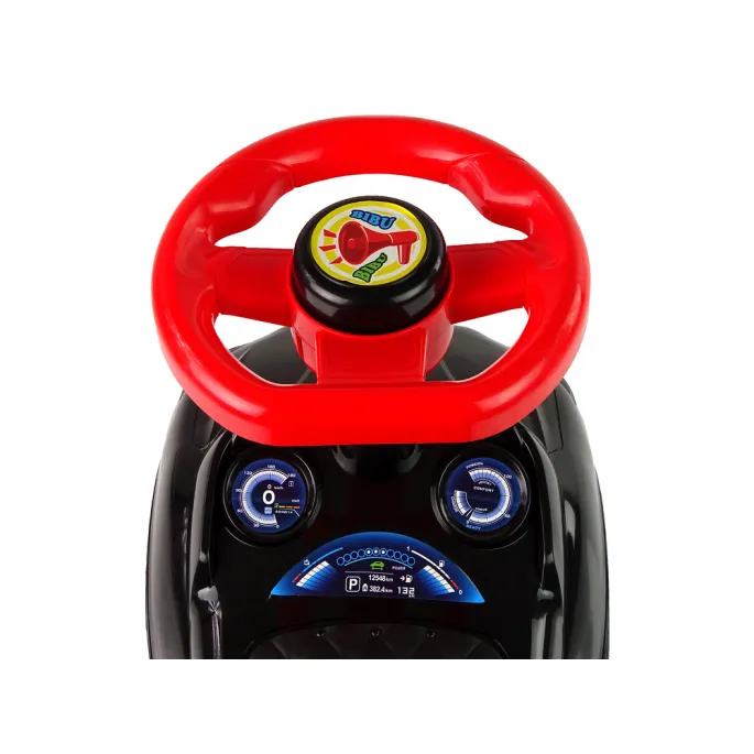 Zbliżenie na naklejki reflektorów i grill dziecięcego jeździka