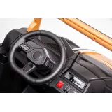 złote auto elektryczne a032 prezentowane z profilu