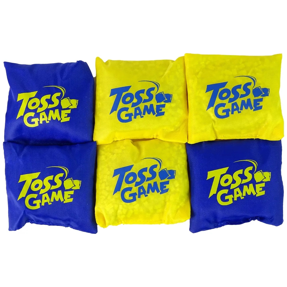 Plansza gry kółko i krzyżyk z żółtymi i niebieskimi woreczkami